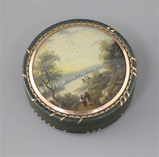 An early 19th century French bois durci snuff box, diameter 3in.